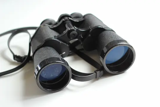 Binoculars on a white background